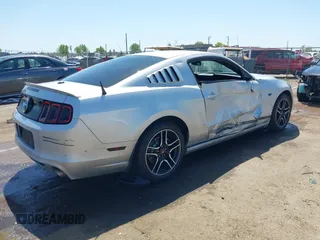 2013 Ford Mustang V6 with VIN 1ZVBP8AM4D5212653, listed as a IAAI auction lot 42090402 with 134,437 mi miles. Bid and sale history available at carsss.com. Image 4.