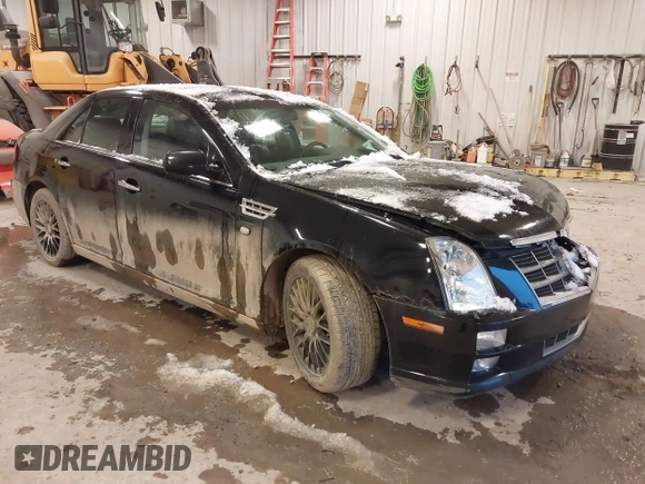 2010 Cadillac STS AWD with VIN 1G6DU6EV2A0125065, listed as a IAAI auction lot 41229886 with 84,954 mi miles and . Bid and sale history available at DreamBid. Image 1.