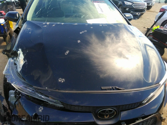 2021 Toyota Corolla LE with VIN JTDEPMAE5MJ126390, listed as a IAAI auction lot 41669331 with 77,398 mi miles. Bid and sale history available at carsss.com. Image 12.