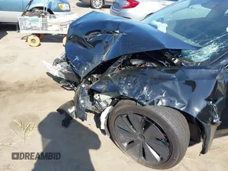 2025 Tesla Model 3 Long Range z VIN 5YJ3E1EA3SF981743, wystawiony jako IAAI lot #42352588 z przebiegiem Nie podano mil oraz . Historia ofert i sprzedaży dostępna na DreamBid. Obrazek 18.