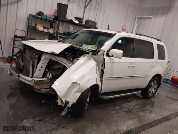 2013 Honda Pilot Touring with VIN 5FNYF4H91DB066110, listed as a IAAI auction lot 41542393 with 188,204 mi miles. Bid and sale history available at carsss.com. Image 15.
