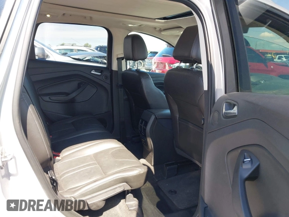 2013 Ford Escape Titanium z VIN 1FMCU0J94DUD84163, wystawiony jako IAAI lot #42406932 z przebiegiem 111 258 mil mil oraz . Historia ofert i sprzedaży dostępna na DreamBid. Obrazek 8.