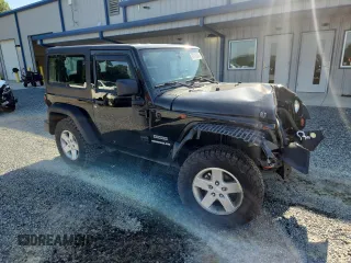 2012 Jeep Wrangler Sport with VIN 1C4AJWAG5CL273292, listed as a Copart auction lot 60135395 with 123,874 mi miles and Salvage title. Bid and sale history available at DreamBid. Image 4.