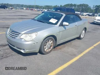 2009 Chrysler Sebring Touring with VIN 1C3LC55D99N574422, listed as a IAAI auction lot 42595676 with 141,603 mi miles and . Bid and sale history available at DreamBid. Image 2.