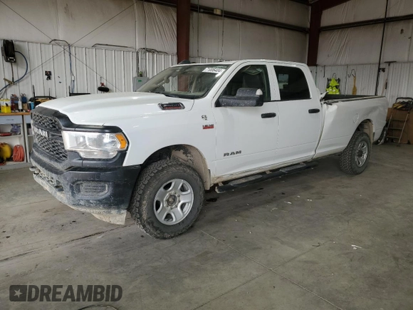 2020 Ram 2500 Tradesman with VIN 3C6UR5HJ7LG178299, listed as a Copart auction lot 71006404 with 214,734 mi miles and Salvage Title. Bid and sale history available at carsss.com. Image 1.