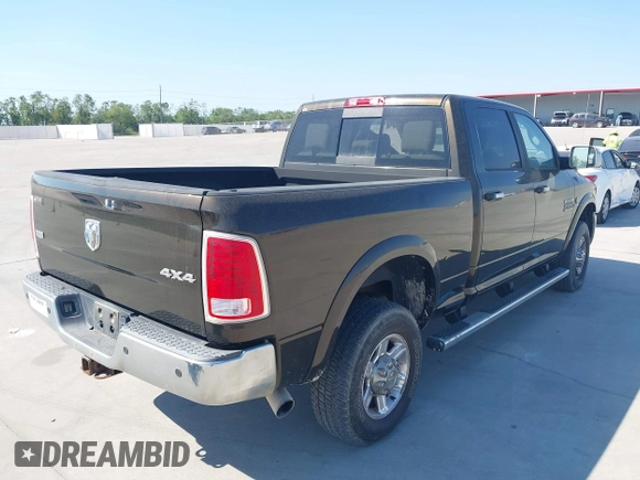 2013 Ram 2500 Laramie with VIN 3C6UR5FL7DG529590, listed as a IAAI auction lot 40608177 with 141,594 mi miles and . Bid and sale history available at DreamBid. Image 4.