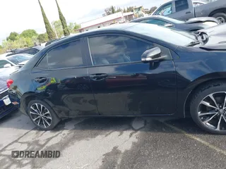 2019 Toyota Corolla L with VIN 5YFBURHE6KP892992, listed as a IAAI auction lot 42057187 with 80,304 mi miles and . Bid and sale history available at DreamBid. Image 13.