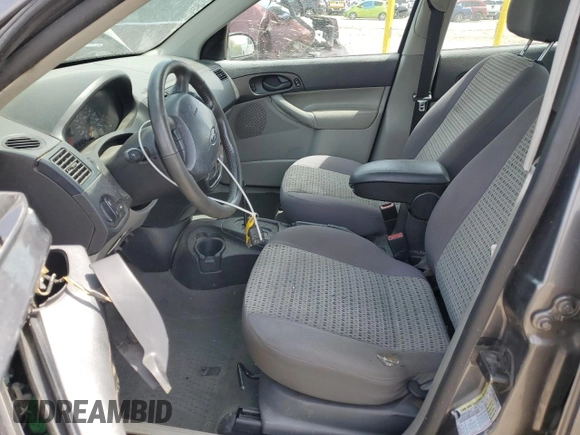 2007 Ford Focus S z VIN 1FAHP34N17W103625, wystawiony jako Copart lot #55300395 z przebiegiem 82 041 mil mil oraz Szkoda całkowita • Salvage title. Historia ofert i sprzedaży dostępna na DreamBid. Obrazek 7.