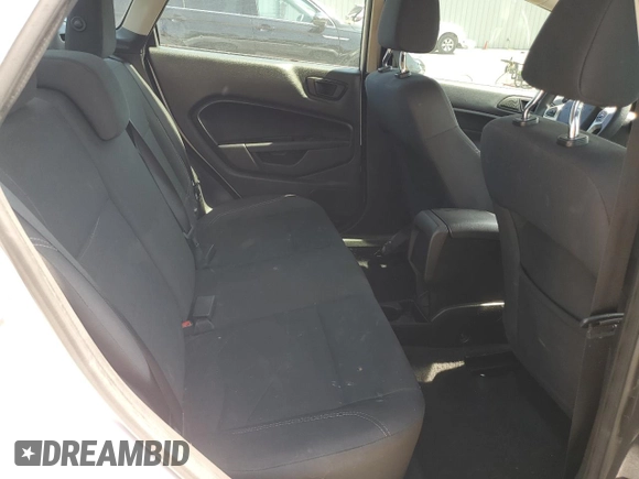 2019 Ford Fiesta SE z VIN 3FADP4BJ2KM147288, wystawiony jako Copart lot #55391125 z przebiegiem 83 887 mil mil oraz Szkoda całkowita • Salvage title. Historia ofert i sprzedaży dostępna na DreamBid. Obrazek 10.