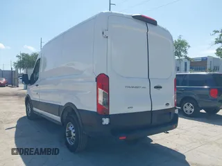 2023 Ford Transit Cargo with VIN 1FTBR2C87PKB38306, listed as a IAAI auction lot 41972454 with 51,049 mi miles and . Bid and sale history available at DreamBid. Image 3.