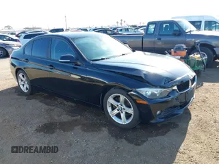2013 BMW 3 Series 320i with VIN WBA3B1C57DF461779, listed as a IAAI auction lot 41991156 with 134,592 mi miles. Bid and sale history available at carsss.com. Image 1.