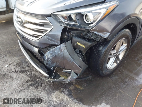 2018 Hyundai Santa Fe 2.4L with VIN 5XYZT3LB0JG525150, listed as a IAAI auction lot 42070377 with 142,418 mi miles and . Bid and sale history available at DreamBid. Image 6.