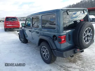 2024 Jeep Wrangler Sport S with VIN 1C4PJXDN2RW306332, listed as a IAAI auction lot 41036573 with 1,785 mi miles and . Bid and sale history available at DreamBid. Image 3.