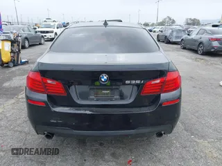 2015 BMW 5 Series 535i with VIN WBA5B1C55FG128387, listed as a IAAI auction lot 41885806 with 94,734 mi miles and . Bid and sale history available at carsss.com. Image 16.