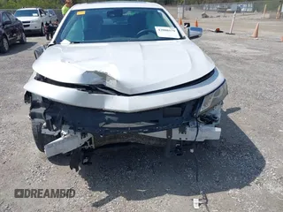 2018 Chevrolet Impala Premier with VIN 2G1125S31J9107593, listed as a IAAI auction lot 42008579 with 243,170 mi miles and . Bid and sale history available at DreamBid. Image 6.