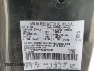 2003 Ford F-150 XL with VIN 1FTRX07WX3KB99581, listed as a Copart auction lot 56907765 with 232,597 mi miles and Salvage title. Bid and sale history available at DreamBid. Image 12.