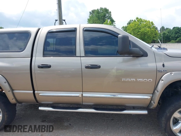 2007 Dodge 1500 Laramie with VIN 1D7HU18277S182772, listed as a IAAI auction lot 42282881 with 163,790 mi miles and . Bid and sale history available at DreamBid. Image 13.