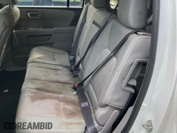 2015 Honda Pilot SE with VIN 5FNYF4H39FB028011, listed as a IAAI auction lot 42160830 with 202,846 mi miles and . Bid and sale history available at DreamBid. Image 6.