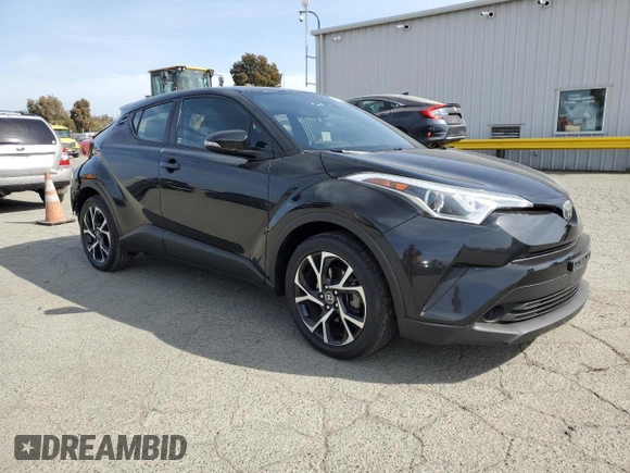 2018 Toyota C-HR XLE z VIN NMTKHMBXXJR024077, wystawiony jako Copart lot #53398025 z przebiegiem 97 079 mil mil oraz Szkoda całkowita • Salvage title. Historia ofert i sprzedaży dostępna na DreamBid. Obrazek 4.