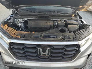 2024 Honda Pilot EX-L 7 Passenger with VIN 5FNYG1H55RB031828, listed as a Copart auction lot 76163374 with 12,833 mi miles and Salvage Title. Bid and sale history available at carsss.com. Image 12.