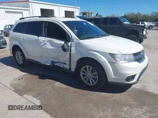 2017 Dodge Journey SXT z VIN 3C4PDCBG9HT510635, wystawiony jako IAAI lot #41590439 z przebiegiem 131 054 mil mil oraz . Historia ofert i sprzedaży dostępna na DreamBid. Obrazek 1.