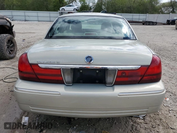 2004 Mercury Grand Marquis GS z VIN 2MEFM74W94X601693, wystawiony jako Copart lot #56303935 z przebiegiem 98 674 mil mil oraz Czysty tytuł • Clean title. Historia ofert i sprzedaży dostępna na DreamBid. Obrazek 6.