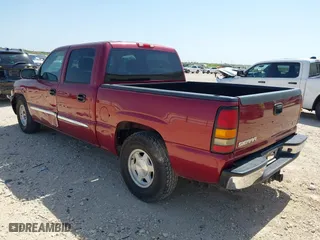 2004 GMC Sierra 1500 Crew Cab SLT with VIN 2GTEC13T841320704, listed as a IAAI auction lot 42015057 with 290,751 mi miles. Bid and sale history available at carsss.com. Image 3.
