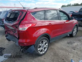 2014 Ford Escape Titanium with VIN 1FMCU9J95EUB05518, listed as a IAAI auction lot 41734025 with 188,243 mi miles. Bid and sale history available at carsss.com. Image 4.