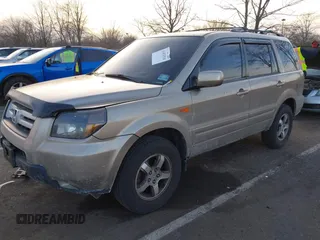 2007 Honda Pilot EX-L with VIN 2HKYF18667H509331, listed as a IAAI auction lot 41453510 with 228,746 mi miles and . Bid and sale history available at DreamBid. Image 17.