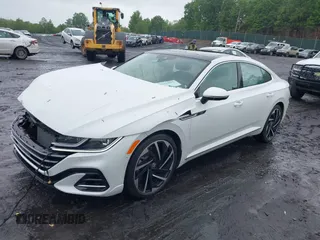 2023 Volkswagen Arteon SEL Premium R-Line z VIN WVWTR7AN4PE014292, wystawiony jako IAAI lot #42331800 z przebiegiem 6 389 mil mil oraz . Historia ofert i sprzedaży dostępna na DreamBid. Obrazek 2.