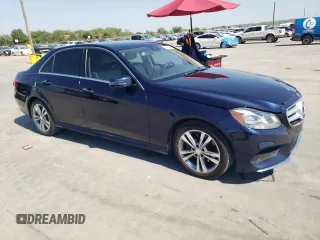 2014 Mercedes-Benz E 400 Sport with VIN WDDHF9FBXEA828496, listed as a Copart auction lot 74585604 with 89,261 mi miles and Clean Title. Bid and sale history available at DreamBid. Image 4.