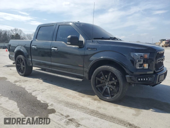 2015 Ford F-150 XLT with VIN 1FTEW1C81FKD32005, listed as a Copart auction lot 48294905 with 142,281 mi miles and Salvage Title. Bid and sale history available at carsss.com. Image 4.