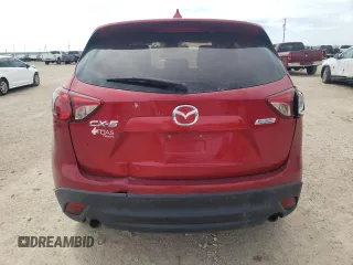 2016 Mazda CX-5 Sport with VIN JM3KE2BY8G0874641, listed as a Copart auction lot 51167845 with 104,571 mi miles and Clean Title. Bid and sale history available at carsss.com. Image 6.