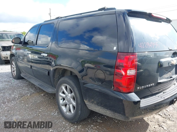 2011 Chevrolet Suburban LT z VIN 1GNSCJE0XBR133465, wystawiony jako IAAI lot #42294755 z przebiegiem 328 824 mil mil oraz . Historia ofert i sprzedaży dostępna na DreamBid. Obrazek 3.