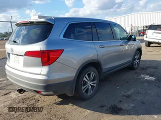 2018 Honda Pilot EX-L with VIN 5FNYF5H56JB000683, listed as a IAAI auction lot 41470855 with 80,301 mi miles. Bid and sale history available at carsss.com. Image 4.
