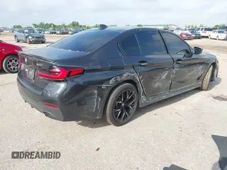 2021 BMW 5 Series 540i with VIN WBA53BJ03MCG98664, listed as a IAAI auction lot 42488708 with 64,101 mi miles and . Bid and sale history available at DreamBid. Image 4.