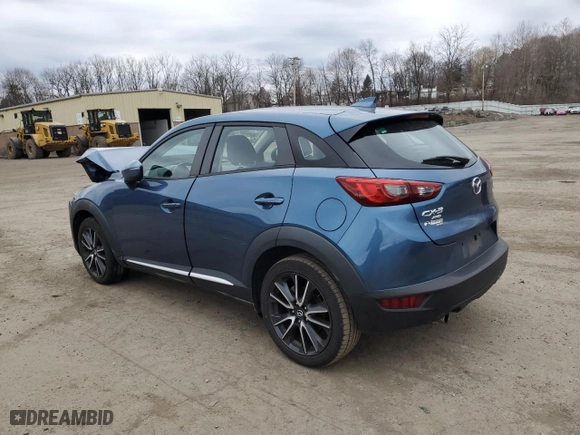 2018 Mazda CX-3 Grand Touring with VIN JM1DKFD72J0310660, listed as a Copart auction lot 48529505 with 65,108 mi miles and Salvage Title. Bid and sale history available at carsss.com. Image 2.
