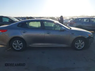 2016 Kia Optima LX with VIN 5XXGT4L39GG102599, listed as a IAAI auction lot 41748147 with 104,712 mi miles. Bid and sale history available at carsss.com. Image 13.