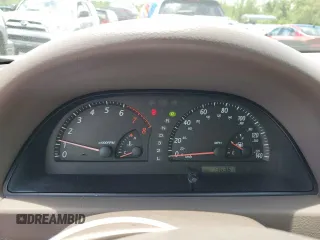2004 Toyota Camry LE z VIN 4T1BF32K94U571035, wystawiony jako Copart lot #56749935 z przebiegiem 136 361 mil mil oraz Szkoda całkowita • Salvage title. Historia ofert i sprzedaży dostępna na DreamBid. Obrazek 9.