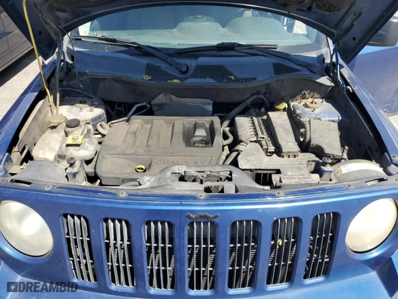 2010 Jeep Patriot Sport with VIN 1J4NT2GB9AD531637, listed as a Copart auction lot 52909885 with 282,147 mi miles and Salvage Title. Bid and sale history available at carsss.com. Image 12.