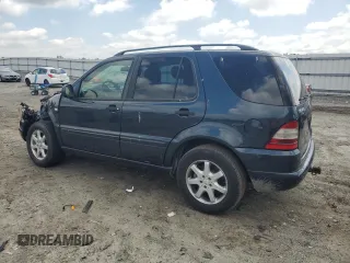 2000 Mercedes-Benz M 320/430/500 with VIN 4JGAB72E7YA168445, listed as a Copart auction lot 59401235 with 231,591 mi miles and Salvage title. Bid and sale history available at DreamBid. Image 2.