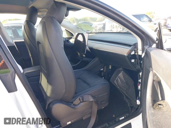 2021 Tesla Model Y Standard Range with VIN 5YJYGDED3MF103650, listed as a IAAI auction lot 41726278 with Not Provided miles and . Bid and sale history available at DreamBid. Image 5.