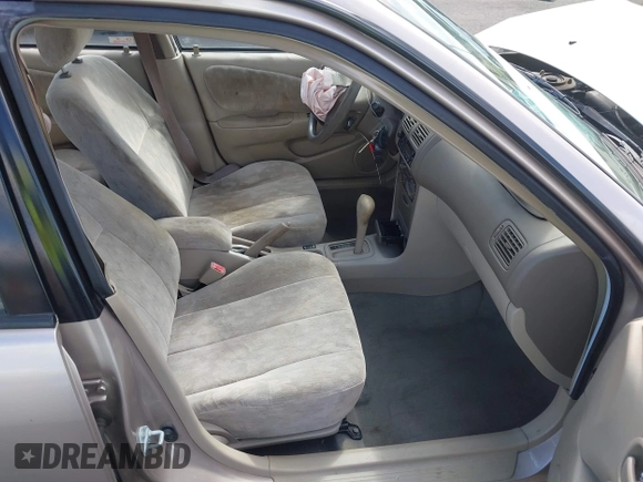 1999 Toyota Corolla VE with VIN 1NXBR12E4XZ182751, listed as a IAAI auction lot 41433066 with 56,904 mi miles and . Bid and sale history available at DreamBid. Image 5.