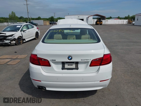 2013 BMW 5 Series 528i xDrive with VIN WBAXH5C54DD107317, listed as a IAAI auction lot 42244446 with 47,858 mi miles and . Bid and sale history available at DreamBid. Image 16.