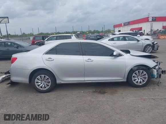 2014 Toyota Camry L with VIN 4T1BF1FK6EU346670, listed as a IAAI auction lot 41942544 with 140,438 mi miles and . Bid and sale history available at DreamBid. Image 14.