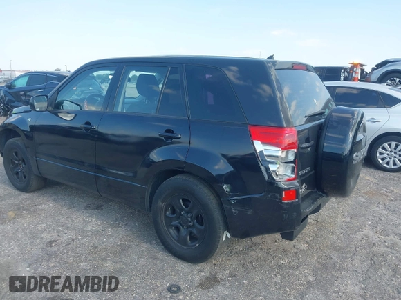2008 Suzuki Grand Vitara with VIN JS3TE941284102380, listed as a IAAI auction lot 42061609 with 103,554 mi miles and . Bid and sale history available at DreamBid. Image 3.
