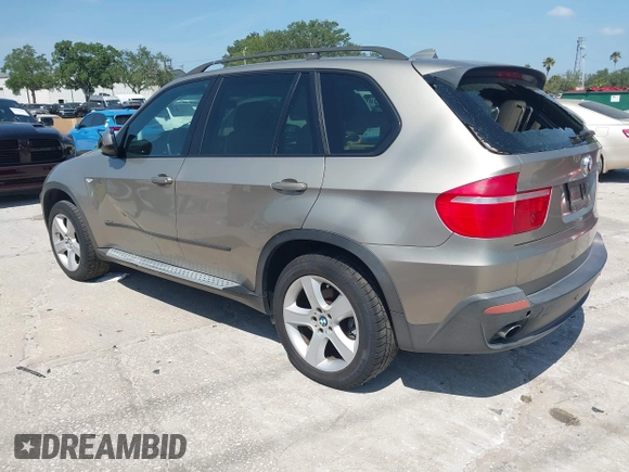 2008 BMW X5 3.0si with VIN 5UXFE43568L024029, listed as a IAAI auction lot 42107247 with 135,607 mi miles. Bid and sale history available at carsss.com. Image 3.