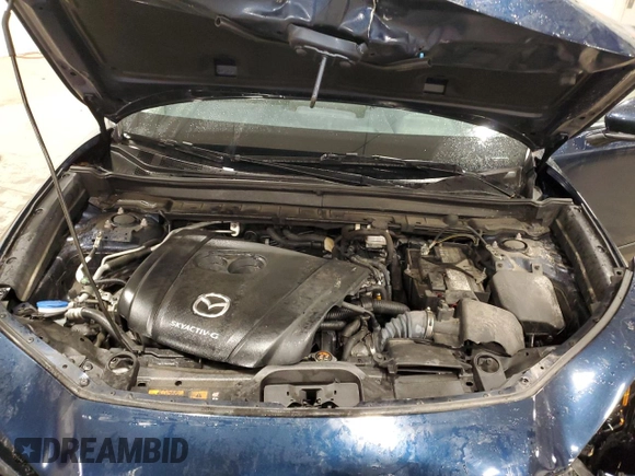 2020 Mazda CX-30 with VIN 3MVDMBBL0LM114783, listed as a Copart auction lot 50521185 with 48,769 mi miles and Salvage Title. Bid and sale history available at DreamBid. Image 14.