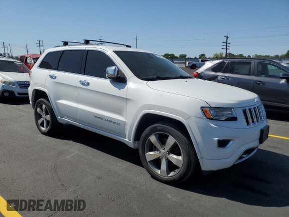 2015 Jeep Grand Cherokee Overland with VIN 1C4RJFCM4FC618516, listed as a Copart auction lot 58671455 with 221,550 mi miles and Clean title. Bid and sale history available at DreamBid. Image 4.