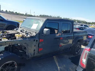 2021 Jeep Gladiator Willys with VIN 1C6HJTAG4ML517715, listed as a IAAI auction lot 41436634 with 21,187 mi miles and . Bid and sale history available at DreamBid. Image 14.